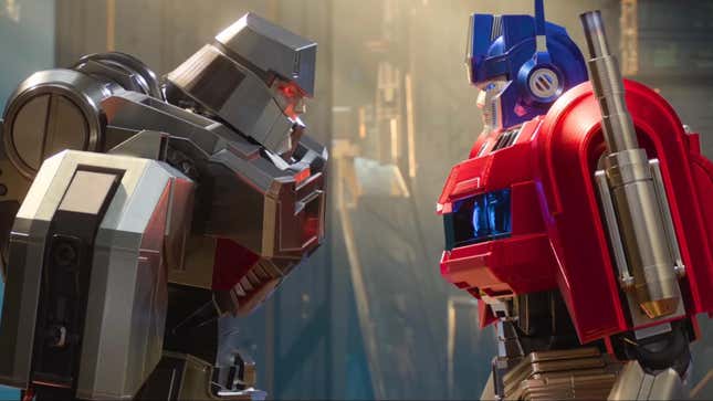 Megatron and Optimus Prime face each other in a moment from Transformers One.